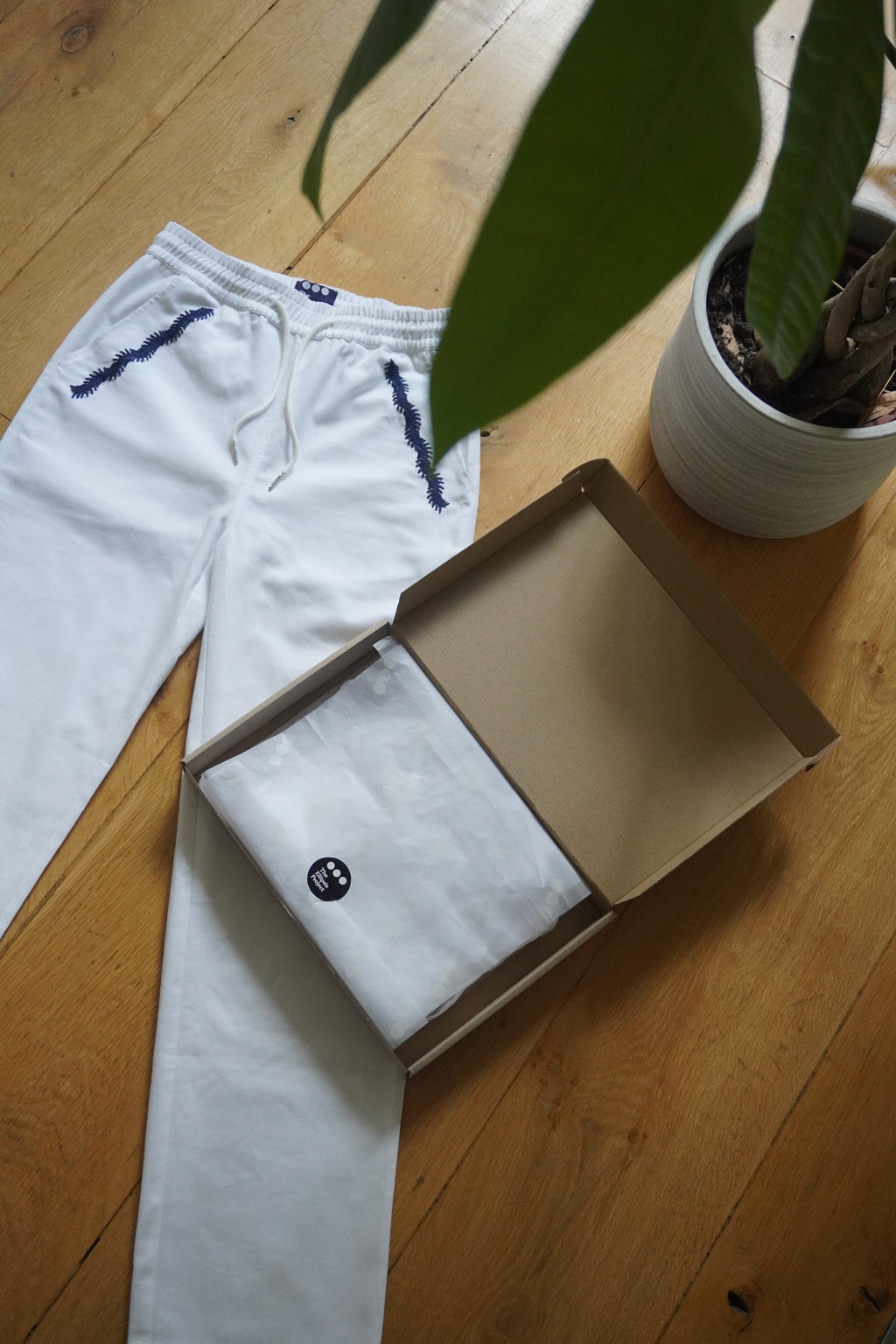 White Straight Leg Ellipsis Trousers